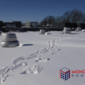 snowy commercial roof 85x85